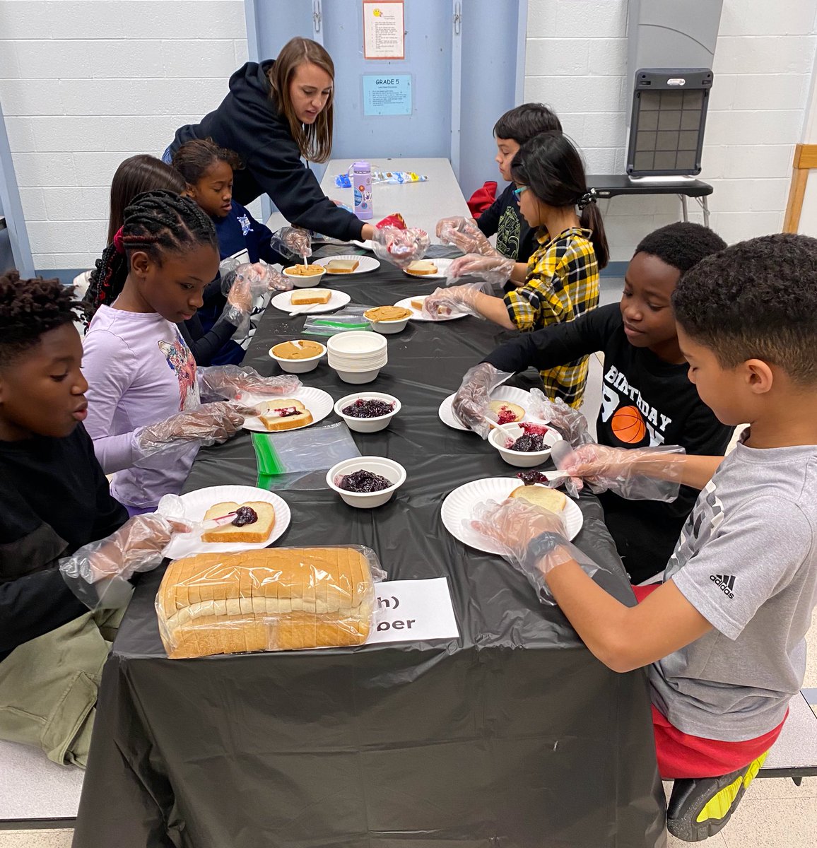 kbrounstein's tweet photo. Proud of these fifth graders for giving back to the community during the organized chaos that is making sandwiches for Shepherd’s Table @McLeanSchool 😆 https://t.co/avmcFiLDVp