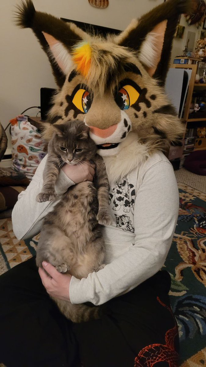 So exhausted this #FursuitFriday ..... good thing I have a snuggly kitty !!!