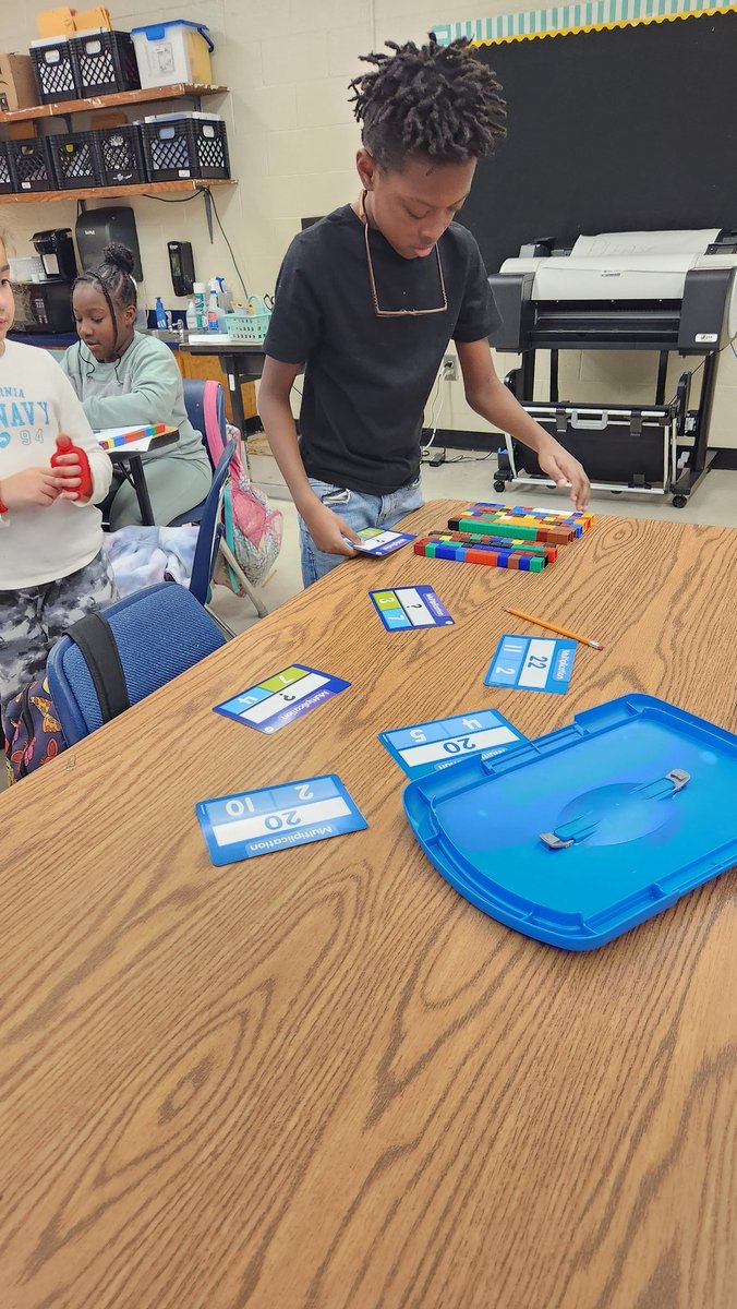 21st CCLC students <a href="/HeardMixon/">Heard-Mixon</a> are working hard to solve multiplication facts.