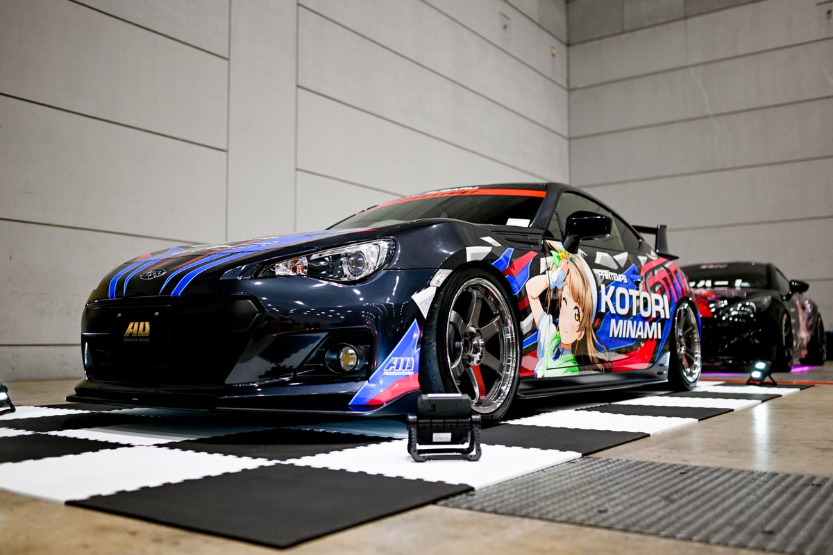 yoneHman0913's tweet image. SUPER GTのデザインをメインに仕上げたレーシーなBRZ。このリアウィングかっこいいんですよね！前日の船旅からありがとうございました！！
＃よねさんフォト #IWCS2023