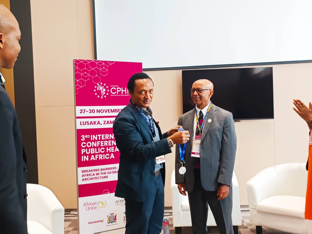 ohanyidof's tweet photo. Dr Wondimagegnehu Alemu DFAPH (@alemuw1 ), a Professor of public health, stands as a testament to the transformative power of dedicated individuals in the field of public health. Born and raised in Ethiopia, his journey began with a profound commitment to serving the health needs of his community. As a young medical doctor, Wondi started his career as a Medical Director of a rural hospital in Ethiopia, demonstrating an early passion for community-focused healthcare.
His path toward becoming a global health leader took shape with his pivotal role at the World Health Organization (@WHO), where he dedicated over two decades of his life. Wondi's leadership at WHO was marked by a series of impactful initiatives, with one of the highlights being the development and implementation of the Integrated Disease Surveillance & Response (#IDSR) Programme in the @WHOAFRO. This programme, under his direction, achieved remarkable success in enhancing disease surveillance and response mechanisms, contributing significantly to the region's public health resilience.
Wondi's journey within WHO took him to various leadership capacities, including serving as the Head of Mission and Representative in Sierra Leone, Uganda, and Nigeria. In these roles, he not only navigated the complexities of healthcare delivery but also coordinated responses to health emergencies and disease outbreaks, showcasing his adept crisis management skills.
Before joining WHO, Wondi contributed to @UNICEF as a Health Project Officer, focusing on child health. His responsibilities included spearheading efforts in childhood diarrhoeal and respiratory disease control, as well as advising on immunisation activities. Wondi played a pivotal role in launching the district microplanning process in Ethiopia, an innovative approach to bolstering national immunisation programme coverage.
Throughout his career, Wondi has been a staunch advocate for immunisation programmes. As the manager of Ethiopia's National Immunisation Programme, he led efforts to achieve Universal Child Immunization (#UCI) by 1990, setting a precedent for the country's commitment to child health.
Wondi's expertise spans a broad spectrum of public health, including health systems and services strengthening, epidemiology, disease prevention and control, and global health leadership. His advocacy extends beyond the clinical realm, emphasising community engagement for the delivery of equitable and quality healthcare to achieve Universal Health Coverage (#UHC) for all. Wondi is also a vocal champion for gender equality and the empowerment of women, actively working towards the elimination of violence against women.
Upon retiring from WHO in 2018, Wondi continued his dedication to education, serving as an Adjunct Faculty at @EmoryUniversity's Hubert Department of Global Health in the USA and @UniversityAbia's Department of Health Sciences in Nigeria. His commitment to nurturing the next generation of public health leaders reflects his belief in the power of knowledge and mentorship.
Despite his retirement, Wondi's expertise remains in high demand. He was called back by @WHOAFRO to contribute as an Advisor to Africa's COVID-19 Pandemic Response, showcasing his continued relevance in addressing contemporary global health challenges. Additionally, he actively supports the Regional Health Emergency Programme's flagship initiatives to enhance preparedness, detection, and response capacities in various countries.
In essence, Dr Alemu's life and career encapsulate a narrative of dedication, leadership, and unwavering commitment to advancing public health globally. His journey from a rural hospital in Ethiopia to the forefront of international health organizations exemplifies the potential of individuals to catalyze positive change in the world.
On 2nd November 2023, @TheWAAPH inducted 8 eminent persons into the Distinguished Fellowship of the Academy of Public Health (#DFAPH), under the leadership of Dr Ferhat Khan FAPH. One of these giants was Dr Alemu.
So, It was my great pleasure and honour on the margins of the last day of the #CPHIA2023 , to complete the circle by presenting his DFAPH Medal and induction package physically with the support of Prof @drchimezie, Dr @bernappiah (@SyracuseU) & Dr @MakweCatherine.
#ConnectInLusaka
@CPHIA_AfricaCDC @Waiph_News
| @roseleke DFAPH @WALETOM DFAPH @JoyPhumaphi_ DFAPH @JhpiegoCEO DFAPH @pgaye DFAPH @MichelSidibe DFAPH #UcheAmazigo DFAPH |
~@DrTedros DFAPH, @MoetiTshidi @JeanKaseya2 @HelenClarkNZ DFAPH, @DreJoanneLiu DFAPH @TheIndPanel @akin_adesina DFAPH @Winnie_Byanyima DFAPH Leith Greenslade DFAPH~