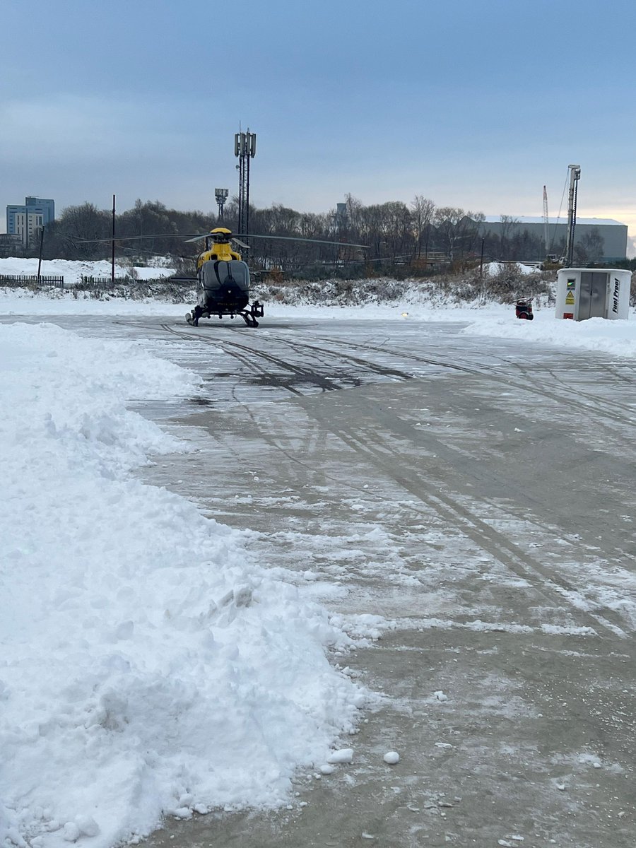 PSOSAir's tweet photo. The crew spent the morning clearing the pad; several inches of snow were cleared with just three shovels before the aircraft could be brought out of the hanger. #PoliceAirSupport #WinterInScotland #KeepingPeopleSafe https://t.co/iBtIQNZiD8