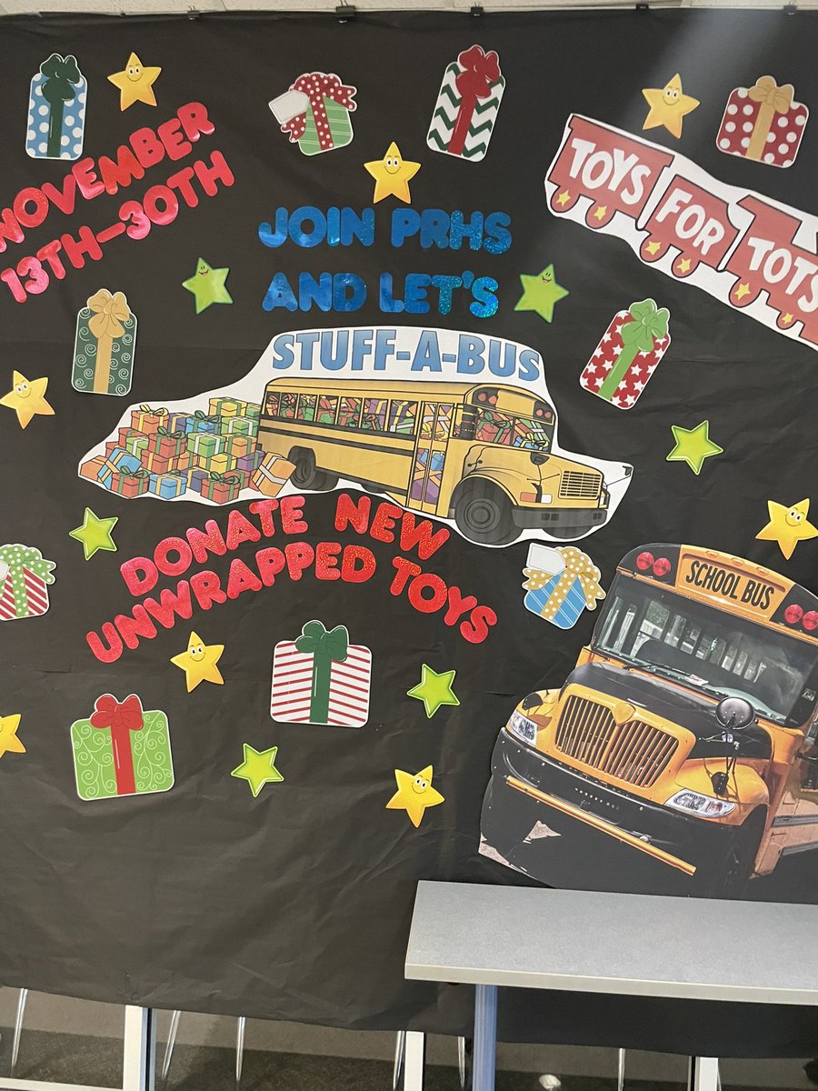 EmilyRoseDunker's tweet photo. So proud of the EHUE students &amp; families who brought in toys for the #StuffaBus drive that benefits #ToysforTots in the local region! Our #RAMBassadors helped fill the bus! 🎁🧸🚌 @PRSchools @ehuepto 💚🐏 https://t.co/9r4cOuSiEU