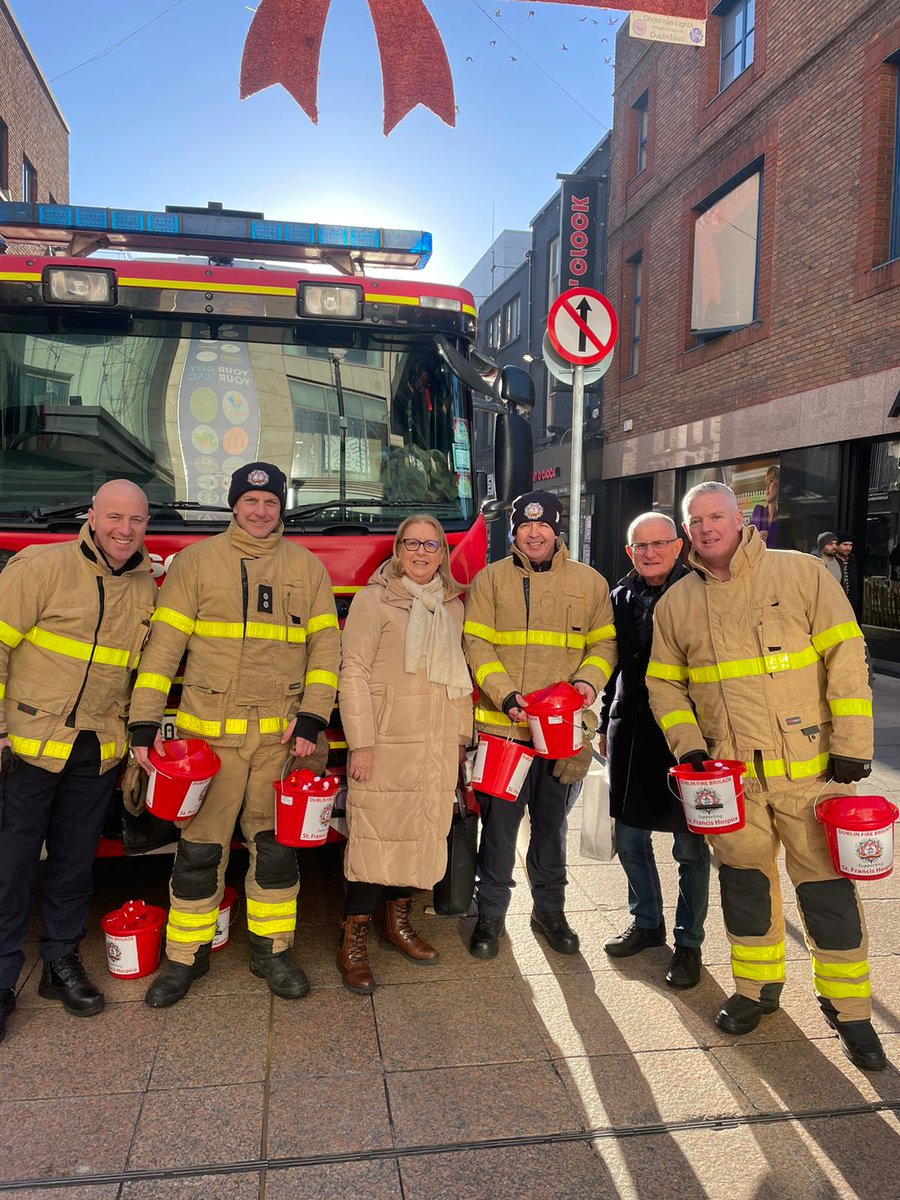 DubFireBrigade's tweet photo. If you happen to be in the city centre around the Henry Street area today say 'hi' to the firefighters who are shaking ... or is it shivering ❄️?.... buckets for Saint Francis Hospice until 4pm

With some famous support too 
@LordMayorDublin 

@SFHDublin https://t.co/n0PKgiV165
