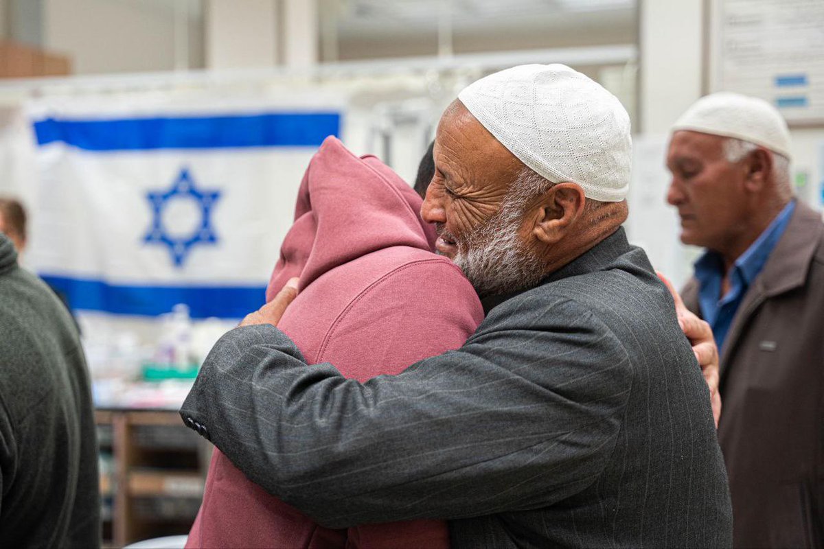 OliLondonTV's tweet photo. Heartwarming photos show former hostages Billal (18) and Aisha Al-Ziadna (17), who are Bedouin Arab Israeli, get reunited with a relieved family member in Israel. https://t.co/KJylEsuWlG