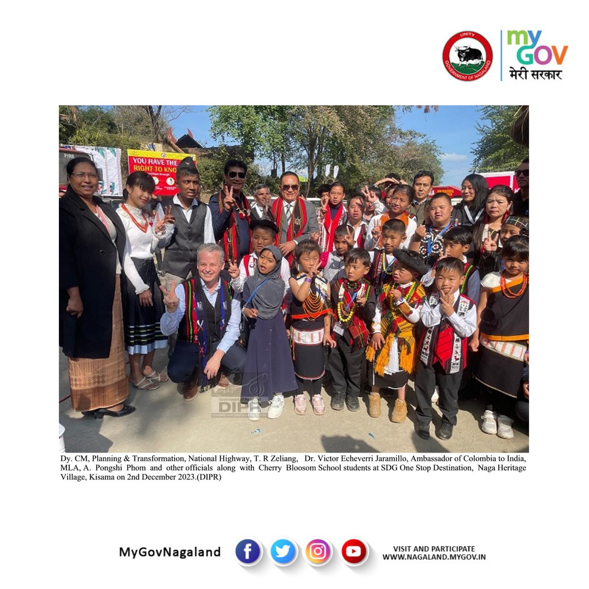 Dy Chief Minister, Planning & Transformation, National Highway,@TRZeliang, H.E. Dr. Victor Echeverri Jaramillo, Ambassador of Colombia to India, MLA, A. Pongshi Phom and other officials along with Cherry Blossom School students at SDG One Stop Destination, #Kisama @dipr_nagaland