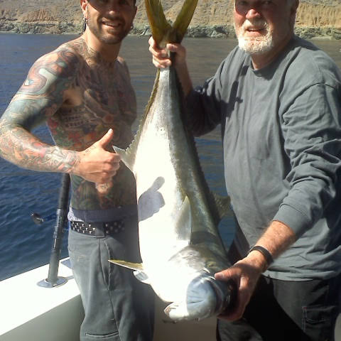 Just two guys, one boat, and a giant Yellowtail Tuna! 🚣‍♂️🎣 #fishinglife #oceanviews  #fishingfun #bigcatch #oceanadventures #yellowtailtuna #yellowtailfishing #joke