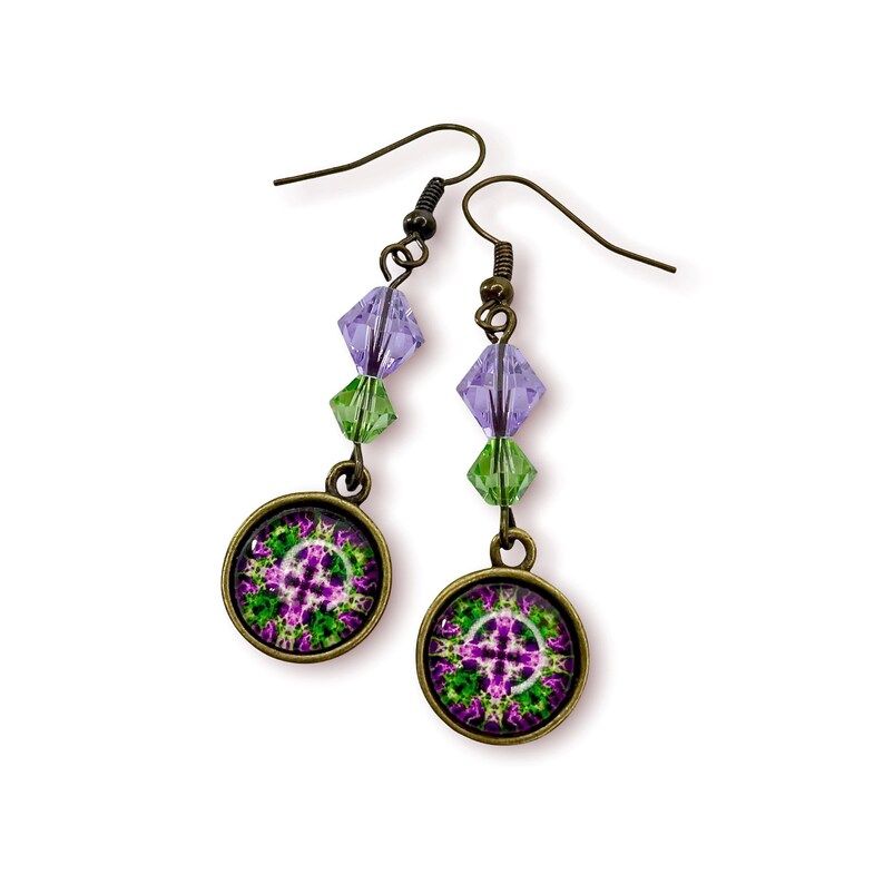 These Boho Candy Colored Mandala Dangle Earrings make great gifts! - Etsy buff.ly/41lsQPT Click now to find these and more! #stockingstuffers #fungiftideas #giftforher