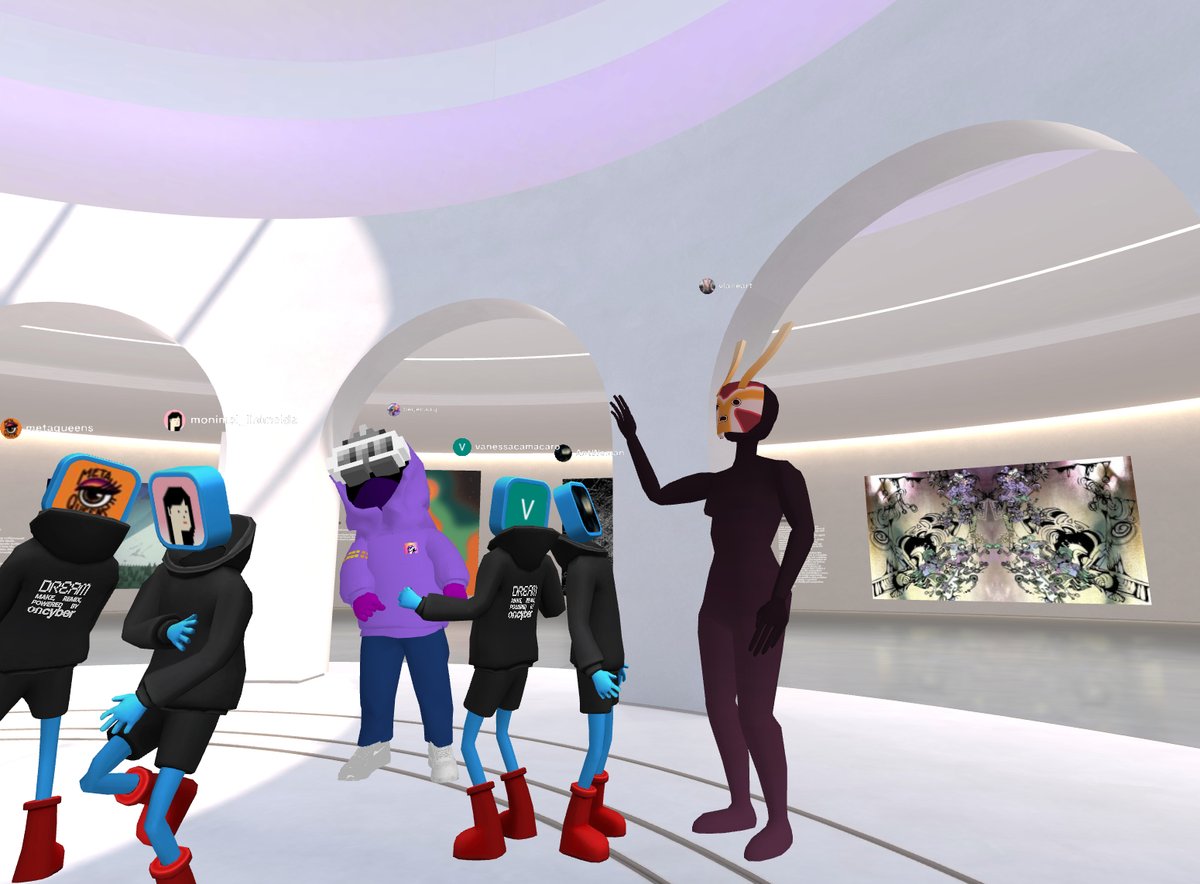ant_woman's tweet photo. Vibing with my friends at the opening of Supercommunity exhibition on Oncyber 🚀🥳

(on the wall - a still image from my new video, soon to be released on FND) https://t.co/5LuZg5BEyL
