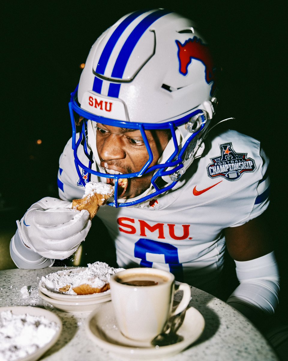 SMUFB's tweet photo. Uniform reveal with a 
side of beignets, please 

🤌 @BryanMassey19 https://t.co/5RTXKtrXYJ