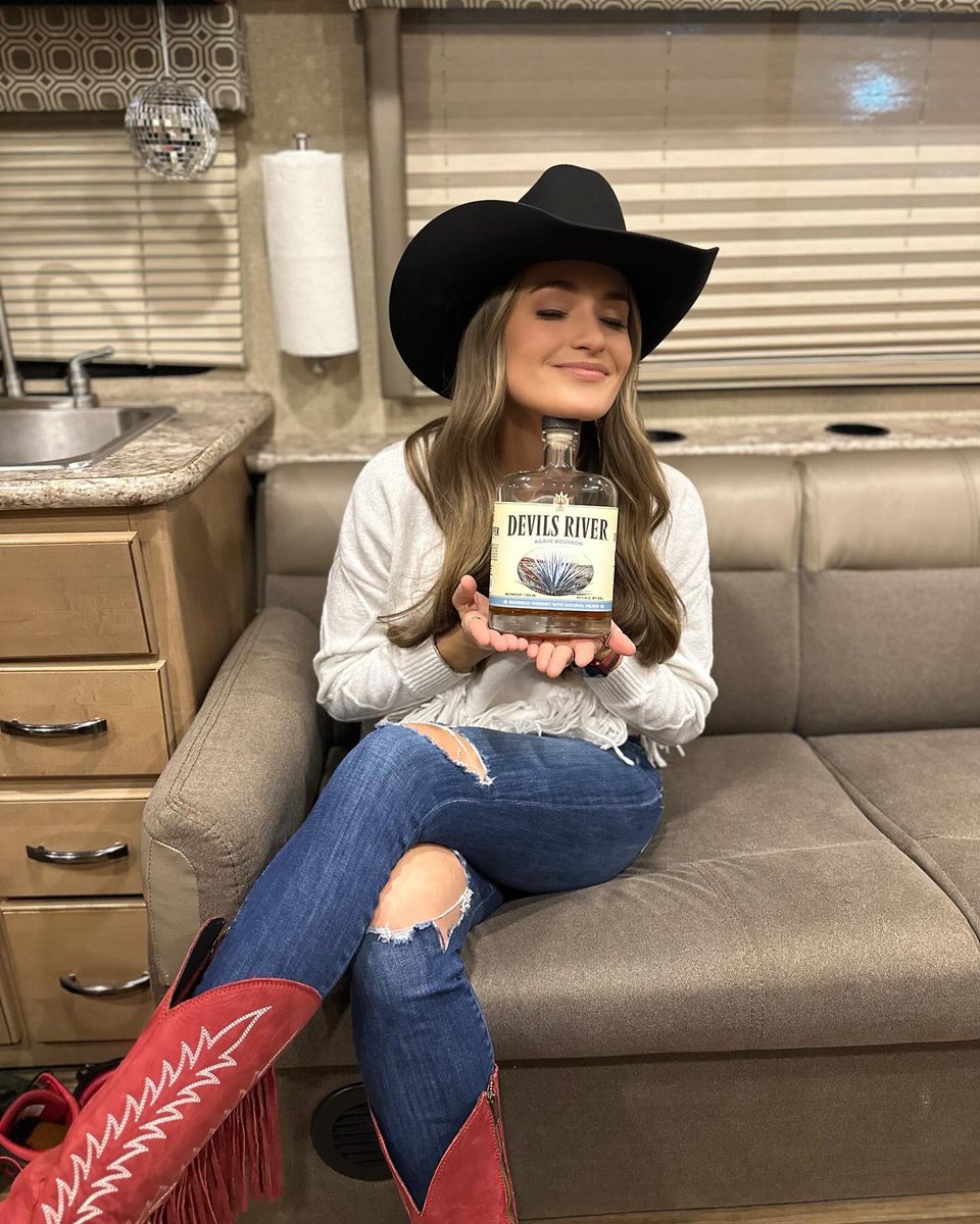BriBagwell's tweet photo. Had a big week, and The Banned bought me my favorite whiskey and a disco ball to celebrate. I rarely forget to pack the heavenly nectar that is @DevilsRWhiskey, so this was the best gift. Y’all seriously have to try the agave if you haven’t yet… 🌵🥃#sinresponsibly https://t.co/YH4hAdMFqm