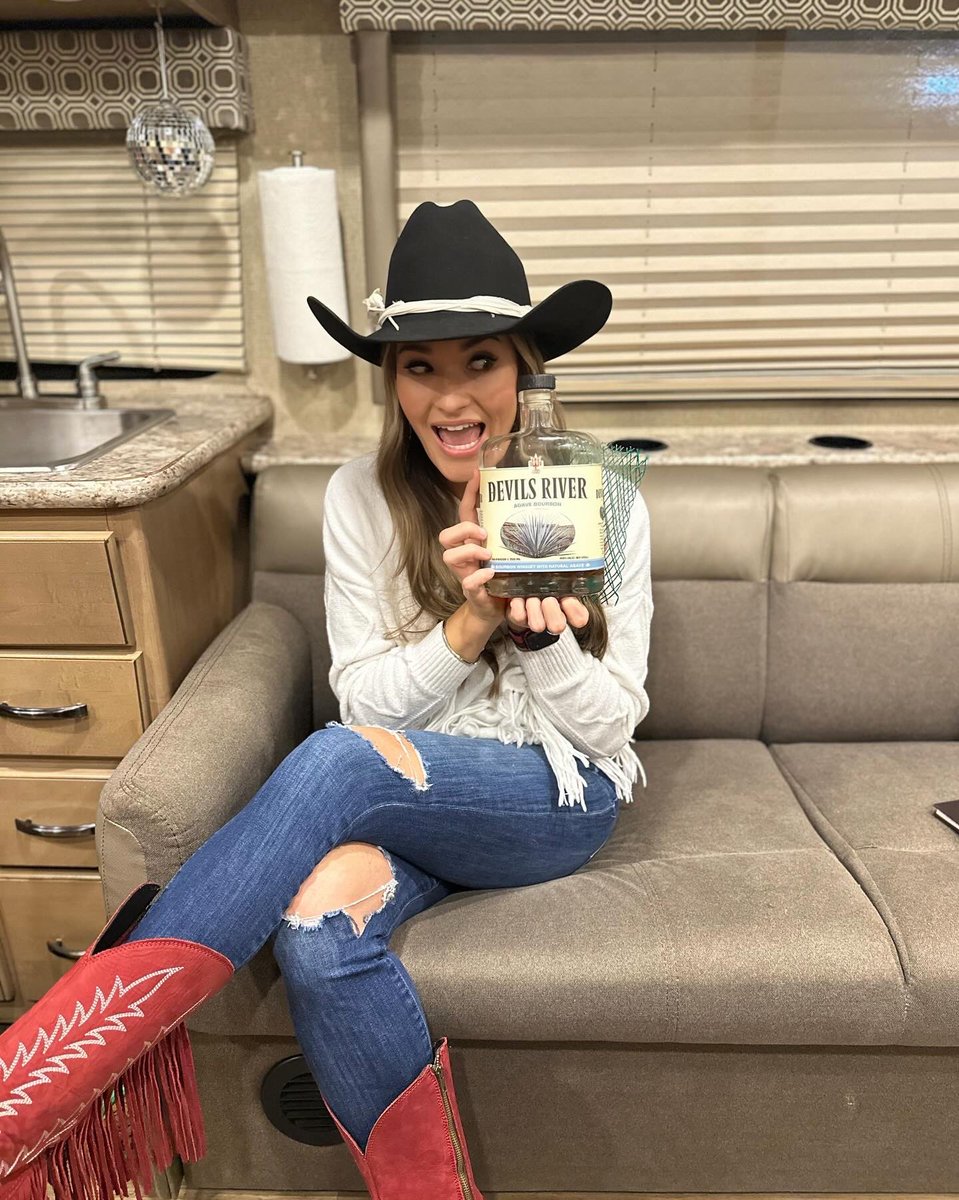 BriBagwell's tweet photo. Had a big week, and The Banned bought me my favorite whiskey and a disco ball to celebrate. I rarely forget to pack the heavenly nectar that is @DevilsRWhiskey, so this was the best gift. Y’all seriously have to try the agave if you haven’t yet… 🌵🥃#sinresponsibly https://t.co/YH4hAdMFqm