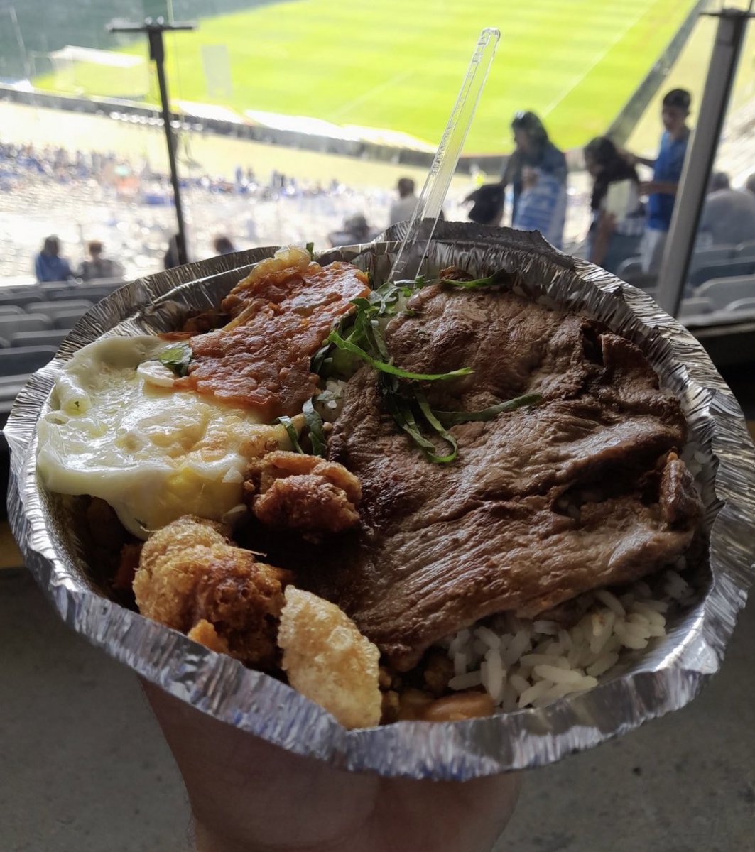 FootyScran's tweet photo. SCRANVENT CALENDAR: DAY TWO 🎄 

Tropeiro - beans, rice, fried egg, crackling, pork steak, tomato sauce, and cabbage at Mineirão (@Cruzeiro)

🇧🇷 ￼ R$20 (£3) https://t.co/1CAEz2ADTM