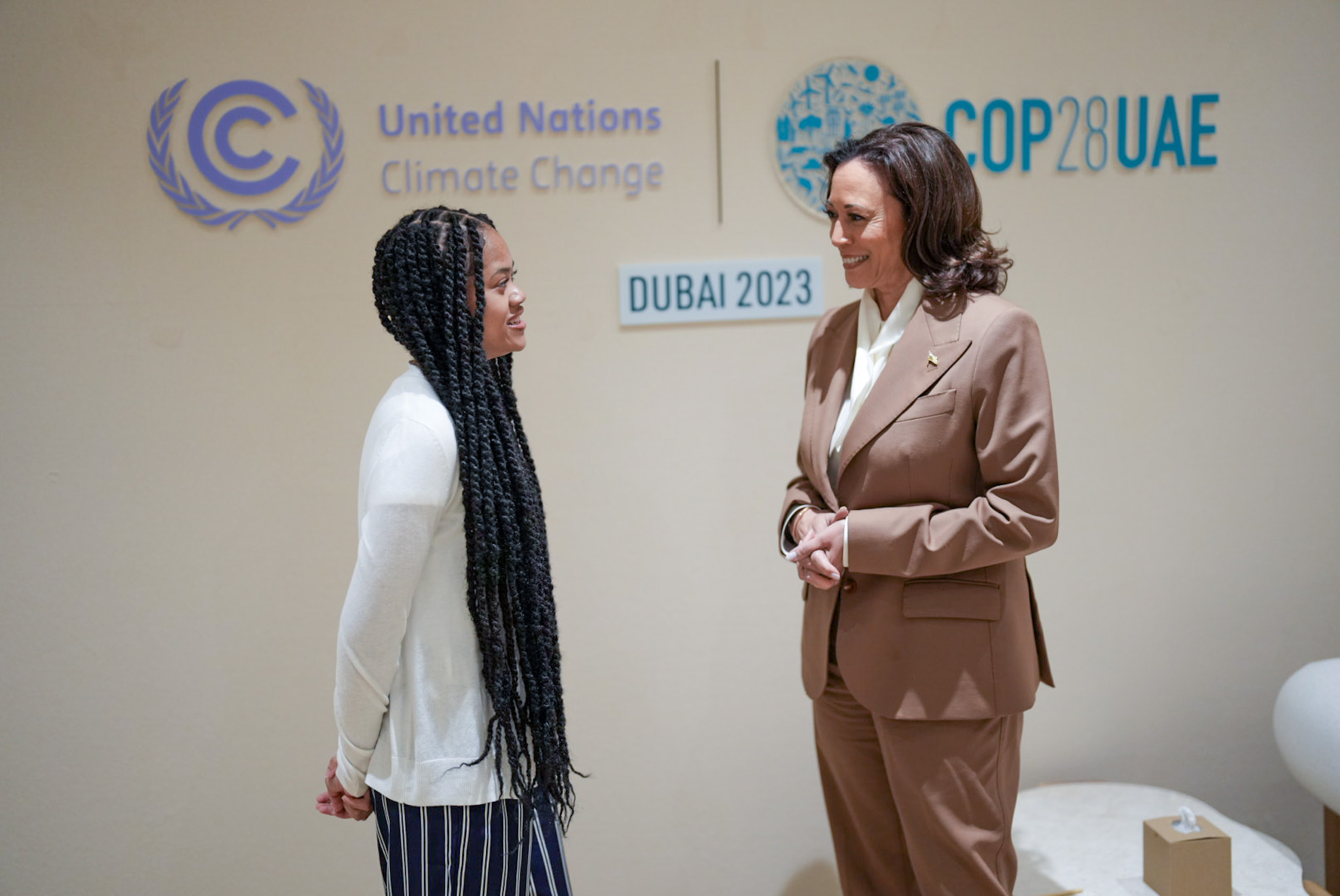 Vice President Kamala Harris speaks with Asada, a member of the EPA's National Environmental Youth Advisory Council (NEYAC).