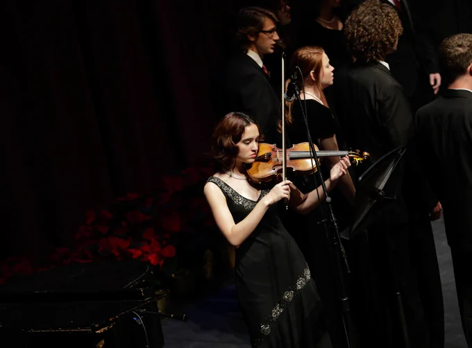 young woman playing the violin