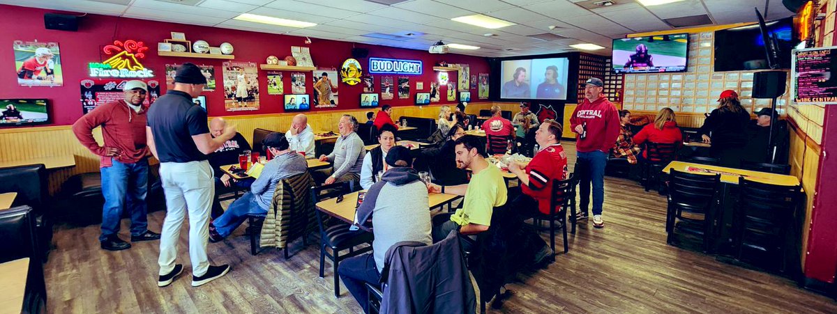 Watching <a href="/CWUFB/">CWU Football</a> in the DII Quarterfinals with fellow Wildcats at Wing Central. Halftime vibes. 🏈