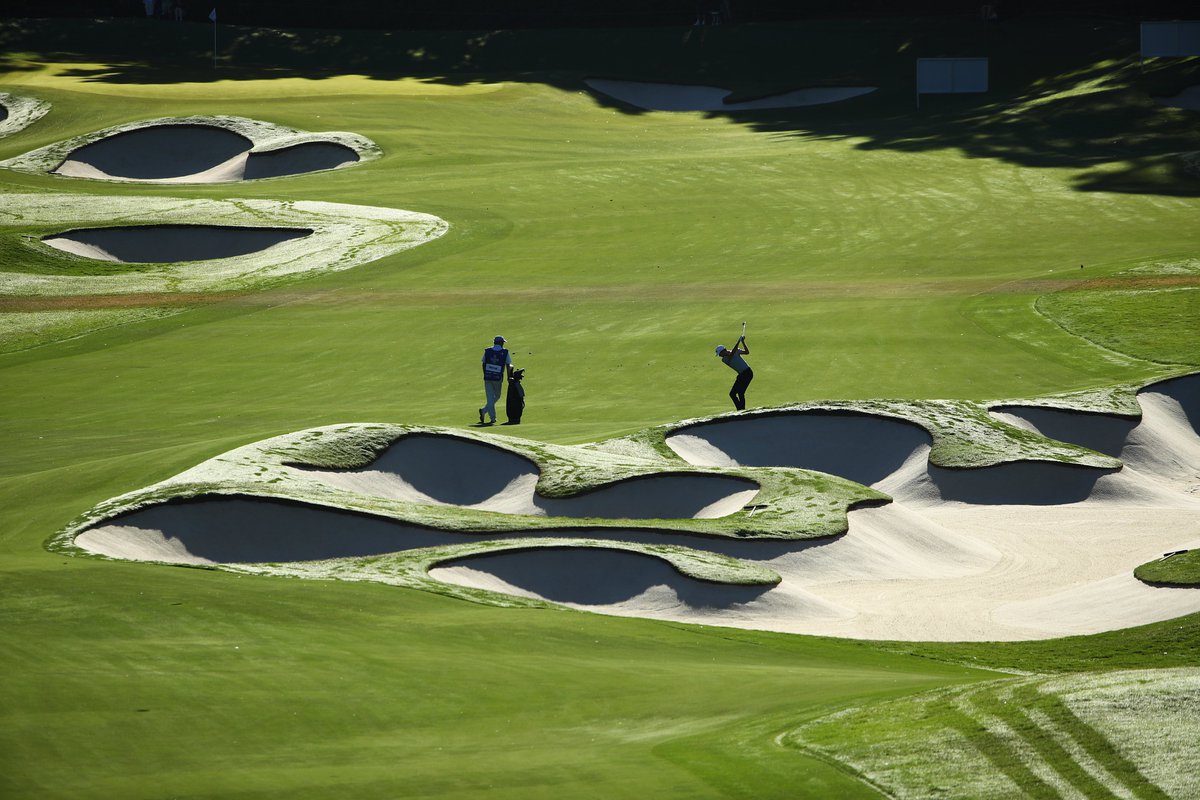 A player and his caddy on a Sunday morning at the <a href="/AusOpenGolf/">Australian Open</a>. Elvis Smylie with <a href="/mikeclaytongolf/">Mike Clayton</a> #AusOpenGolf