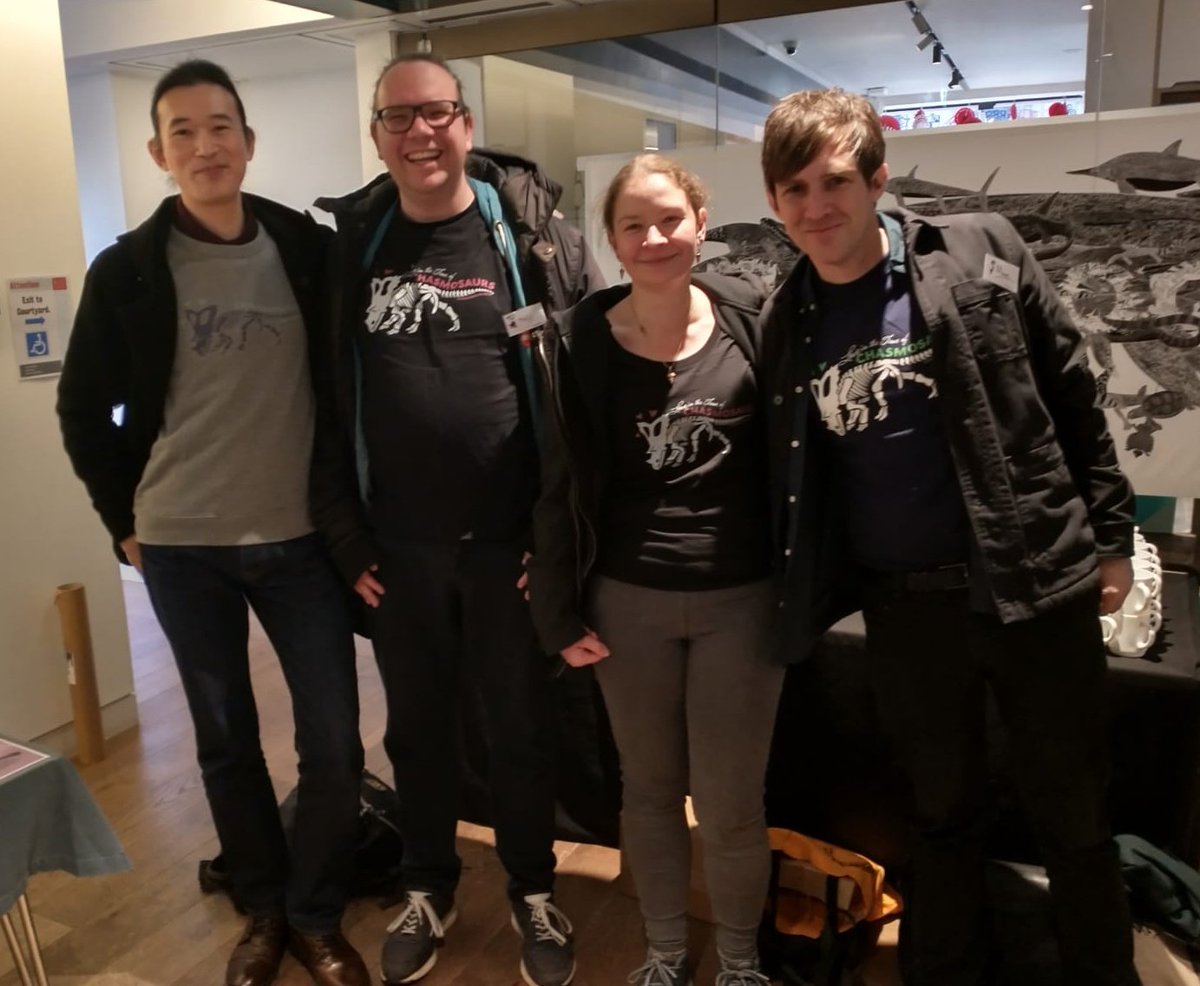 Representing @chasmosaurs at #TetZooCon with a supremely awkward photo. From right, Marc, Agata, Niels, and yours, truly.