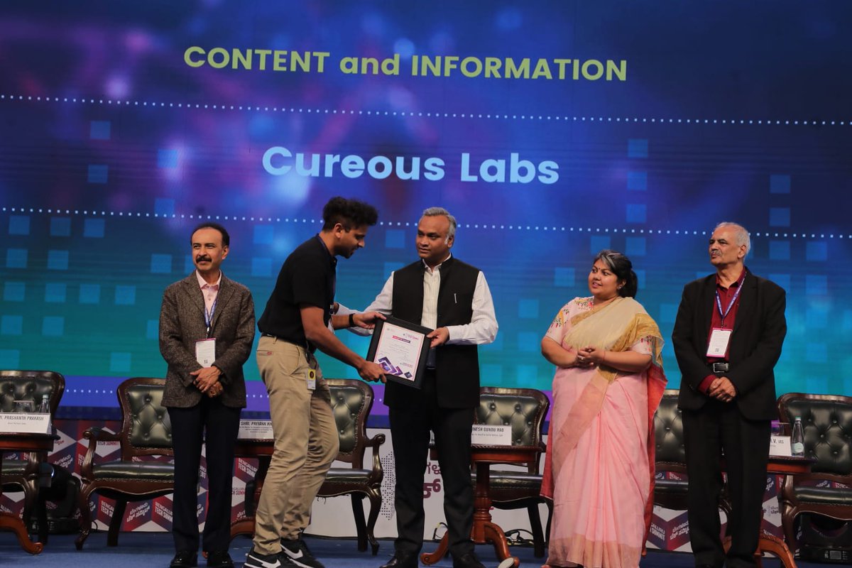 Applauding excellence in exhibition! A huge shoutout to @cureouslabs, honored with the Content and Information Award at the BTS Exhibitor Awards Ceremony at #BTS2023 for setting the benchmark for exhibitors & captivating others. #BengaluruTechSummit #BreakingBoundaries