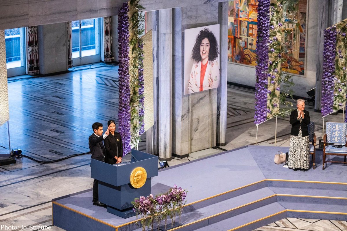 2023 peace laureate Narges Mohammadi is unable to come to Oslo, Norway as she is currently imprisoned in Iran. She was awarded the Nobel Peace Prize for her fight against oppression of women in Iran and for promoting human rights. An empty chair stands in her place on stage.
