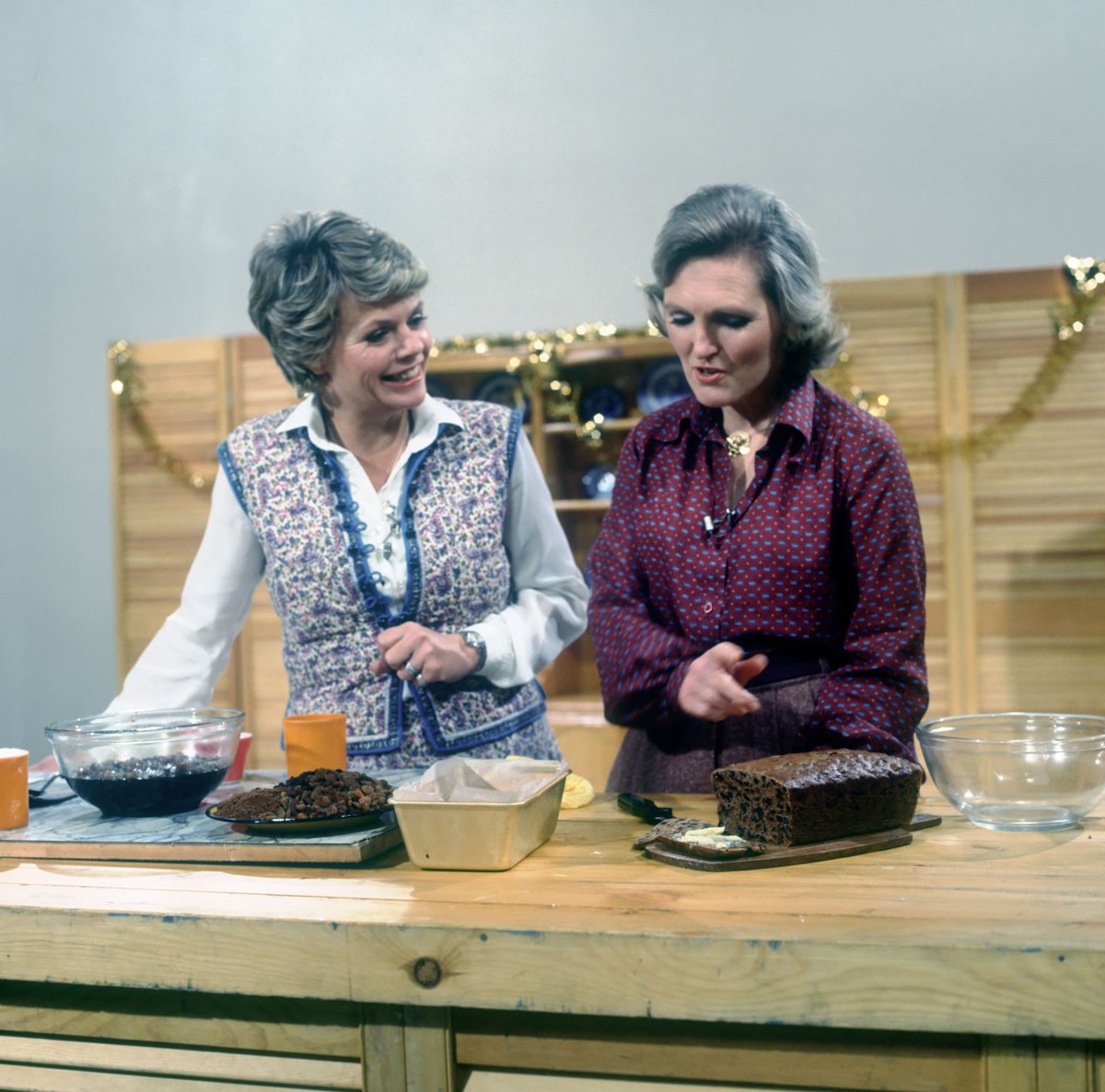 Dame Mary Berry DBE demonstrates Christmas cooking with a Christmas cake for Afternoon Plus in 1978 alongside host Judith Chalmers.
#thameschristmascountdown #maryberry #christmascooking