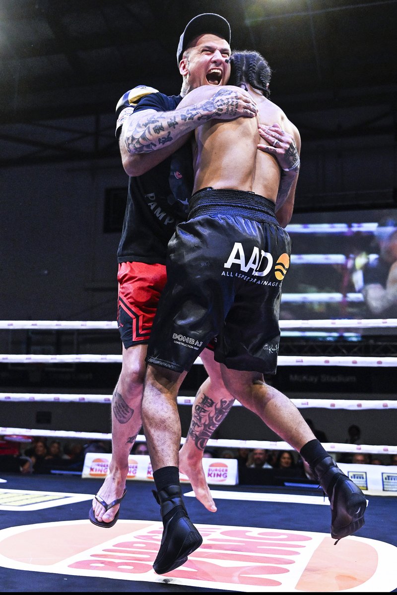 Boxing trainer Isaac Peach celebrates with his fighter Jerome Pampellone in Whangarei on Saturday night. 📷: Andrew Cornaga @PhotosportNZ