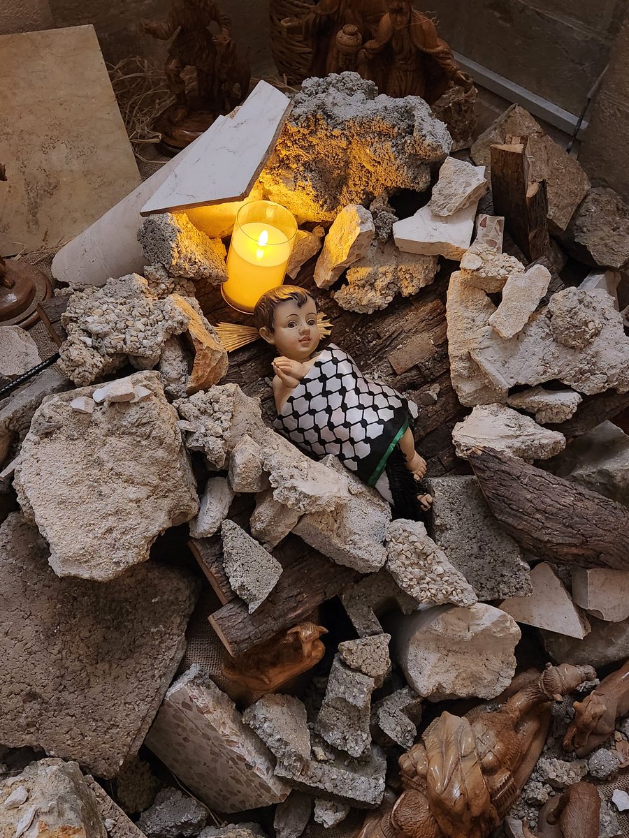 Christmas in Palestine this year. The Child under the rubble. Immanuel God is with us in our pain and suffering. God in solidarity with the oppressed. The child of Bethlehem is our hope. For the children of Gaza and all victims of wars. At the Christmas Lutheran Church Bethlehem