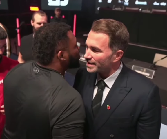 ringmagazine's tweet photo. Eddie Hearn has revealed the heated conversation he had with Jarrell Miller after Anthony Joshua and Deontay Wilder's press conference last month: [@SecondsOutLive]

"He came up to me and he said, 'Oh, you're scared now.'

"I went, 'I ain't f***ing scared of you. I know what you did.'

"He went, 'Why didn't you back me like you backed Conor Benn?'

"I said, 'Because I don't believe you.'

"And he said, 'Well next time when you're in New York, I'll have someone pull up on you.'

"And I said, 'Go f*** yourself.'"