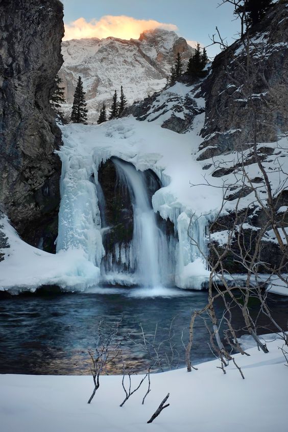 Half frozen water fall in the Canadian Rockies