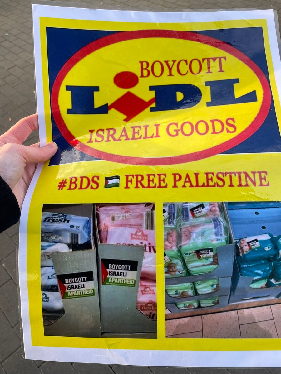 LasairDhearg's tweet photo. Lasair Dhearg activists today attended a protest at Lidl in Andersonstown organised by BDS Belfast. Leaflets informed people of products sold by Lidl that are produced in occupied territories. Customers were asked to sticker these products and later take them from shelves. https://t.co/uc1fXWWjeX