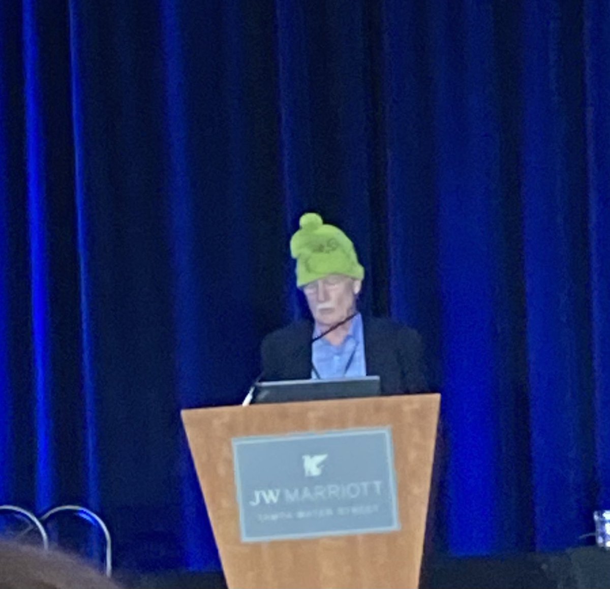 dr_alexharris's tweet photo. Dr. George Koob as the Grinch warning that holiday drinking can be dangerous #acnp2023 https://t.co/KadXRMvWos
