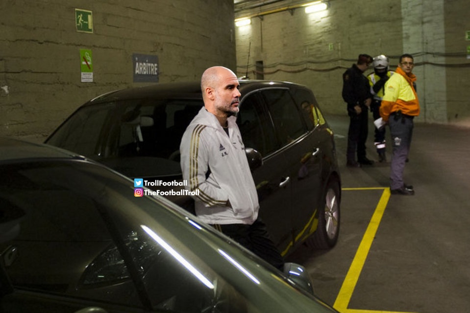 Pep Guardiola waiting for the referee after the game