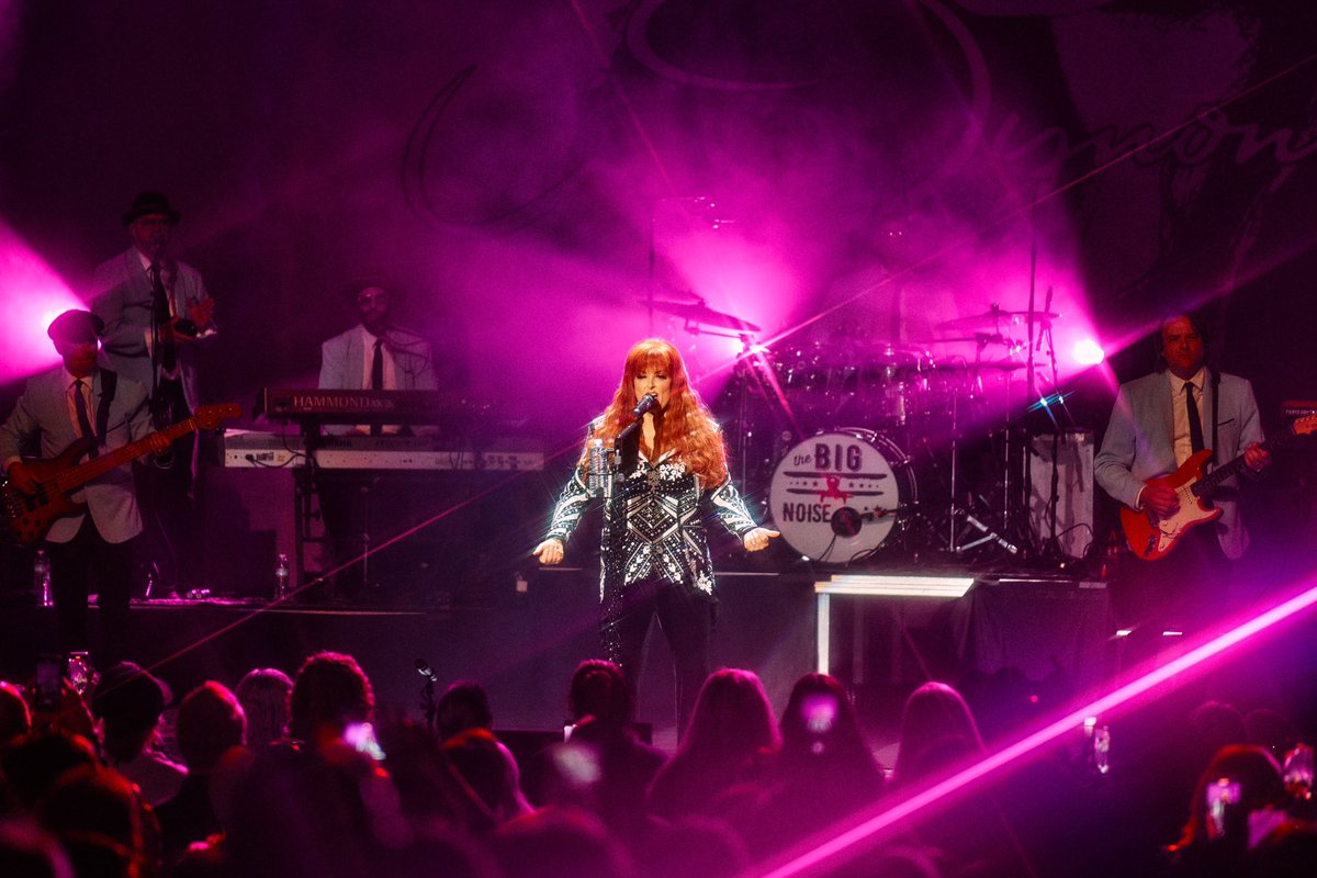 Wynonna's tweet photo. I will be honest, when we came up with the concept of touring my first 2 solo albums in full, I wasn’t sure it was going to work. That thought quickly changed as we announced the tour and watched you all rally behind these songs on social media. When we finally stepped into these beautiful venues, I had the best seat in the house as I watched you breathe life into these songs that otherwise could have been left behind. To the fans…. thank you, thank you, thank you on behalf of myself, my band and my crew for the sold out shows, the friendship bracelets, signs, vintage AND homemade t-shirts, the little surprises along the way, and most of all for reminding us why we do what we do. Believe me… “we’ll meet again, by and by.” 🫶🏼💜 Love you all…always will!