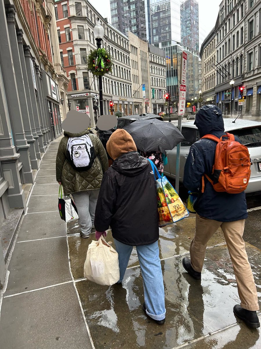 WarmUpBoston's tweet photo. Rain or shine, we are out here, week after week, bringing valuable resources to our unhoused neighbors. It’s always harder to find where folks go to stay dry. Every day we find a new spot along a route we’ve walked for months. This week we supplied folks with (1/2) https://t.co/eFwWNAzBRh