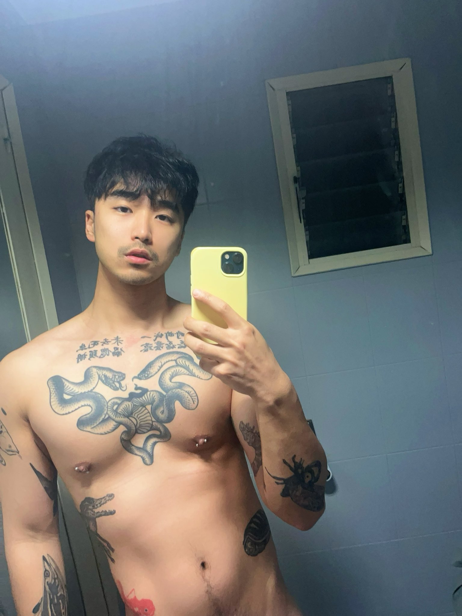 A close up of a man's intimate area, glistening and engorged