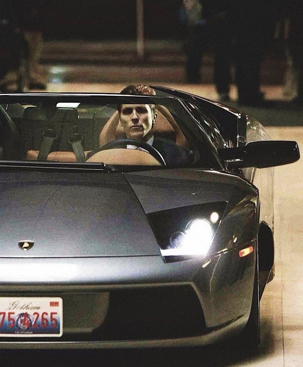 Christian Bale as Bruce Wayne & a Lamborghini Murcielago Roadster