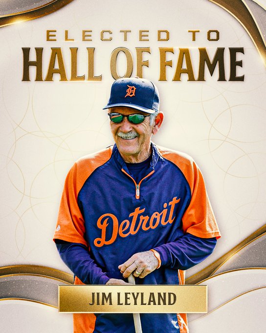 ELECTED TO HALL OF FAME: JIM LEYLAND. Pictured is a cutout of Leyland wearing a dark blue and orange pullover with Detroit in orange script across the front and a Tigers hat. He is smiling, wearing sunglasses, and holding a bat. 