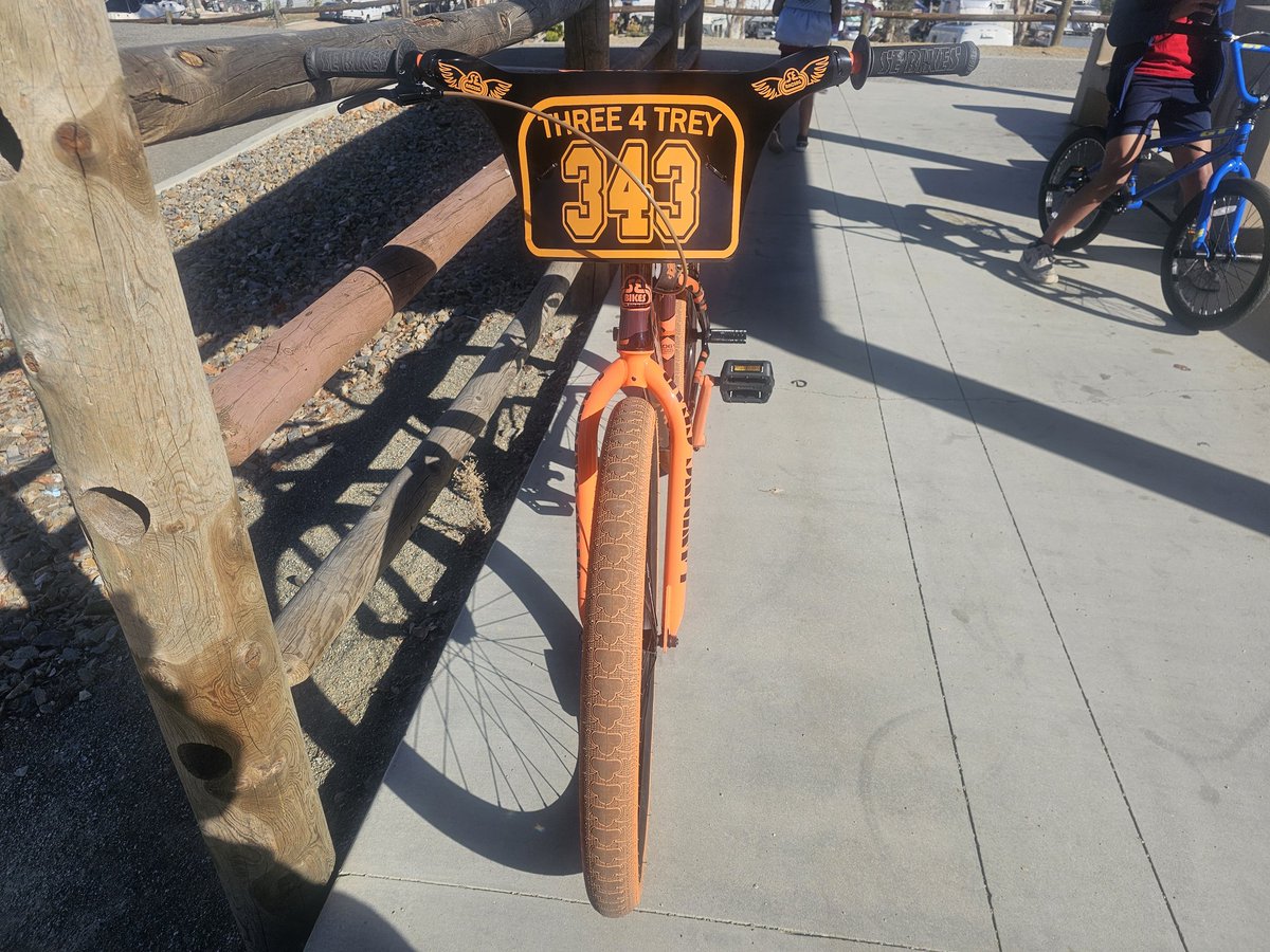 tgarrett83's tweet photo. Pump track day on my @sebikes with the kids. Orange and Black accessories came in clutch! https://t.co/Uq4Amsf1nA