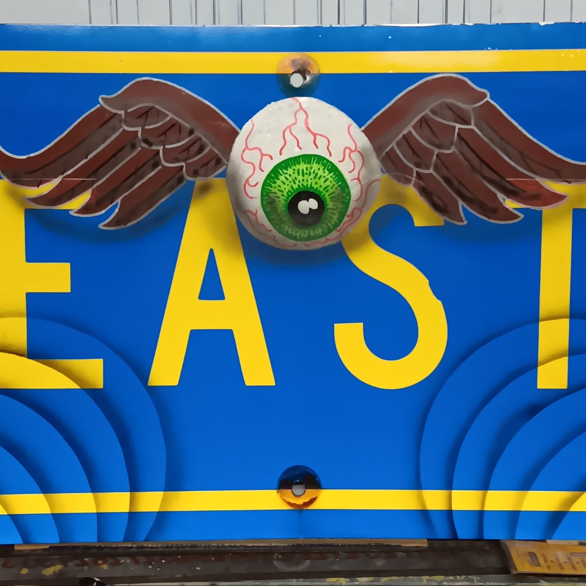 servi53George's tweet photo. Flying eyeball added to an EAST sign 23, mixed media https://t.co/8UJJGk3b42