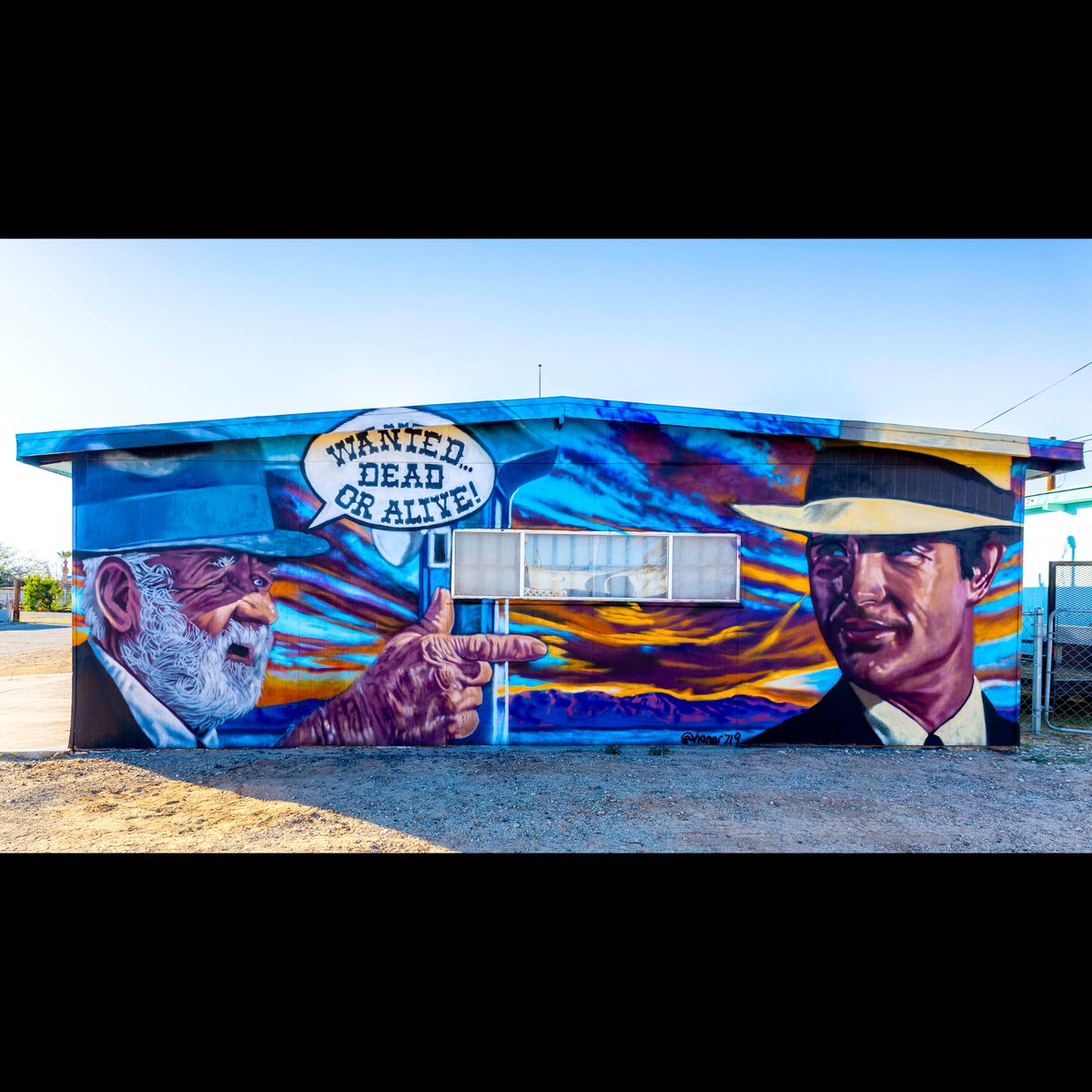 danstiel's tweet photo. Godspeed, Ernie... It really was serendipitous when a neighbor saw me photographing @honor719's Bonnie and Clyde "Wanted Dead or Alive" mural in #BombayBeach and called Ernie to come over to be included in a shot.  Ernie passed today. #saltonsea #muralart #bombaybeachbiennale https://t.co/2EzfOkinEm