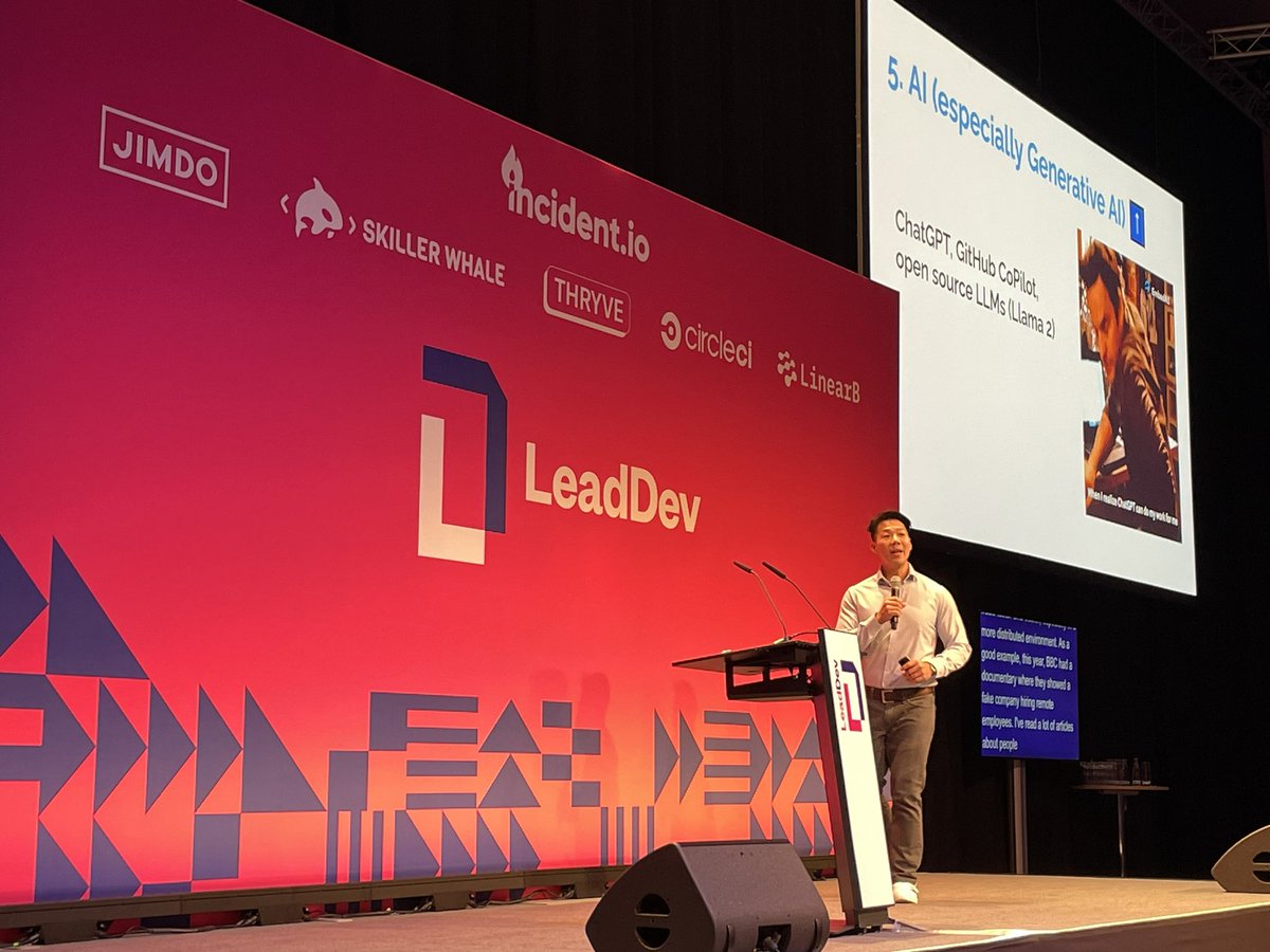.<a href="/patkua/">Pat Kua</a> kicking off #LeadDevBerlin summarizing 2023 tech themes: Return to office/hybrid, Layoffs and some hiring, interest in crypto going down, replaced by generative AI as top topic.