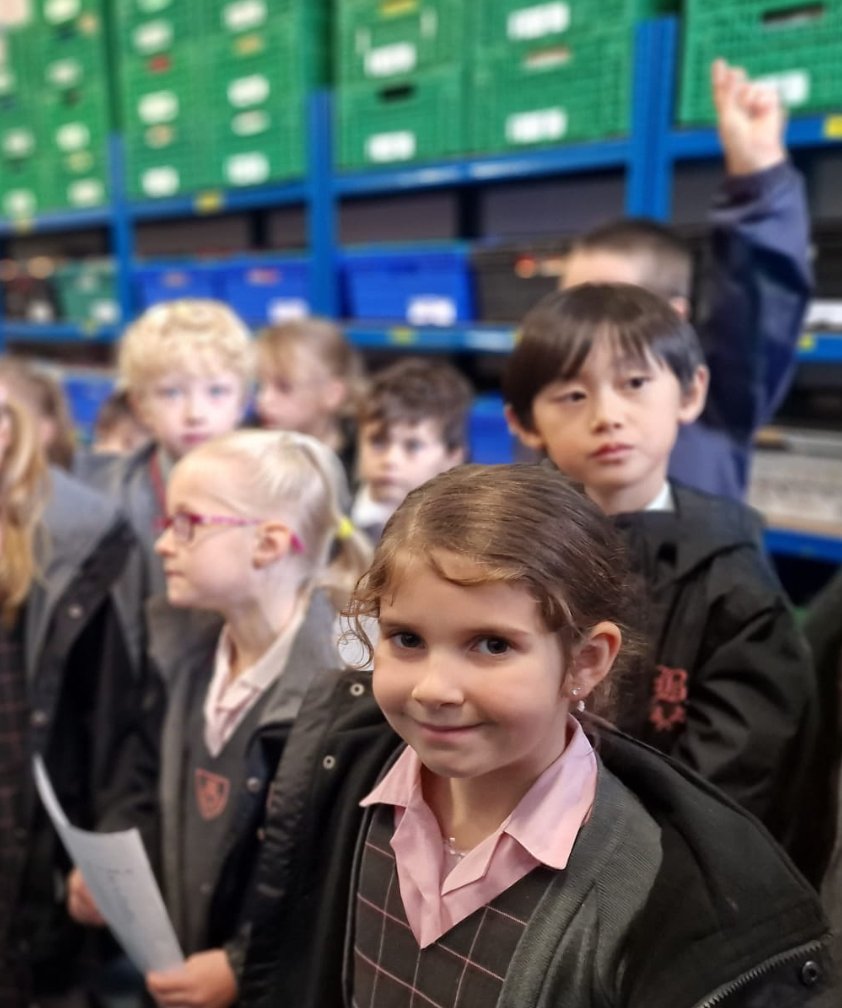 Just a few recent Year 2 activities have included creating dazzling artworks in the style of Romero Britto, making a fire in the woods where they cooked bananas &amp; chocolate &amp; visiting the East Grinstead foodbank to see why their Harvest donations were so essential to so many.