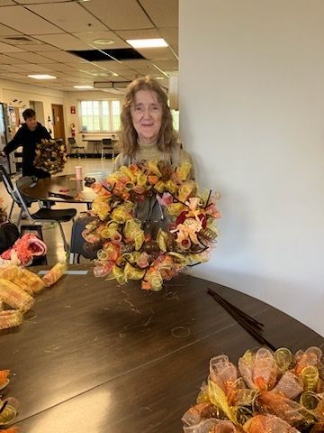 We just 💛 the smiles on the #craft group at 630 Salem St. in #Malden! Their #FallWreaths are getting us into the autumn mood. #SupportiveHousing #olderadults #community