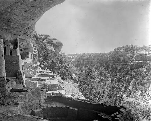View, facing southwest, of ancient Native American (Anasazi) cliff dwelling ruins on Chapin Mesa, Mesa Verde National Park, Montezuma County, Colorado. The stone masonry ruins of Cliff Palace, before excavation, stand underneath a cliffside overh (1915) digital.denverlibrary.org/digital/collec…