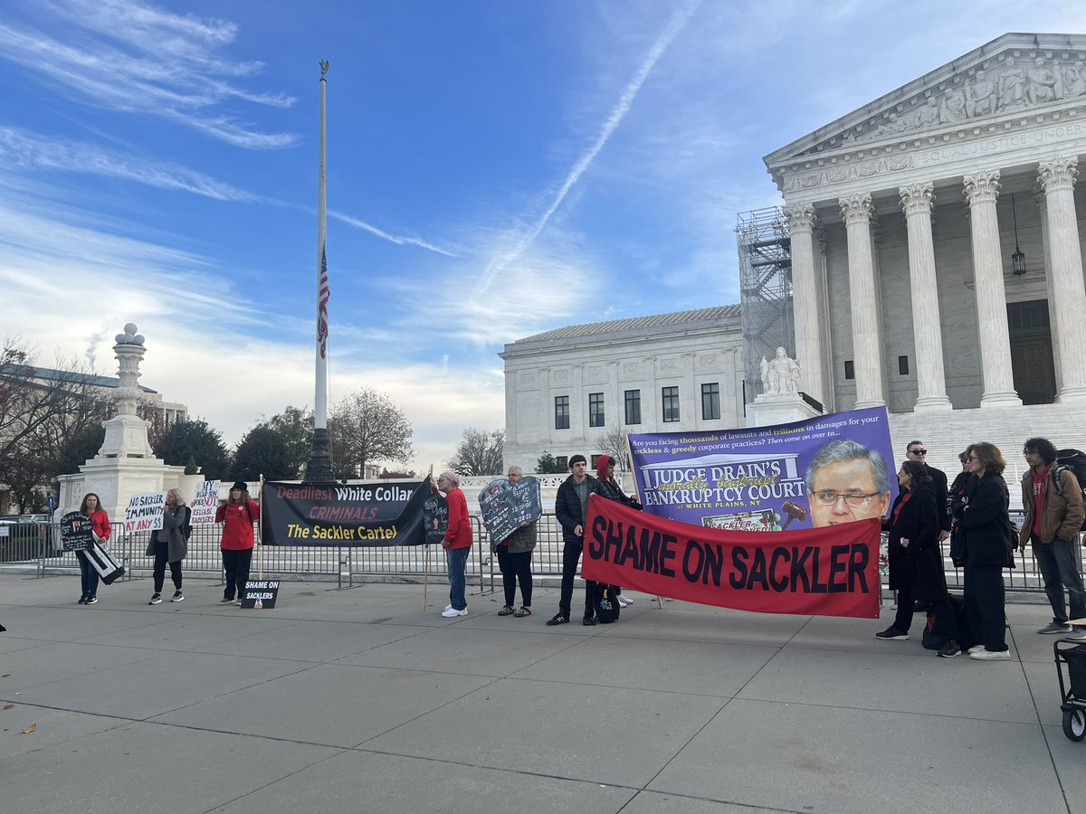 Here at the Supreme Court for Purdue Pharma’s arguments over third-party releases and protesters have gathered, chanting “Shame on Sacklers” and wearing shirts that say “no billionaire releases.”