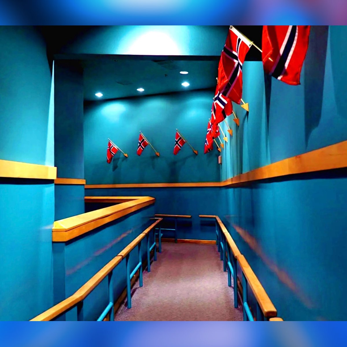 Parkeology's tweet photo. A convention hallway? Maybe a government building? No, it's just what passed for a Disney queue entrance in the late 80s. But around that corner, a high seas Norwegian adventure awaited you in Epcot. Can you picture what lies ahead? You are not the first to pass this way... https://t.co/ExXjRIp1le