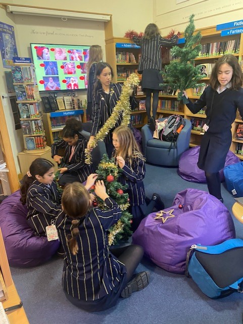 The Book Club elves were out in force today. The Library looks lovely now!