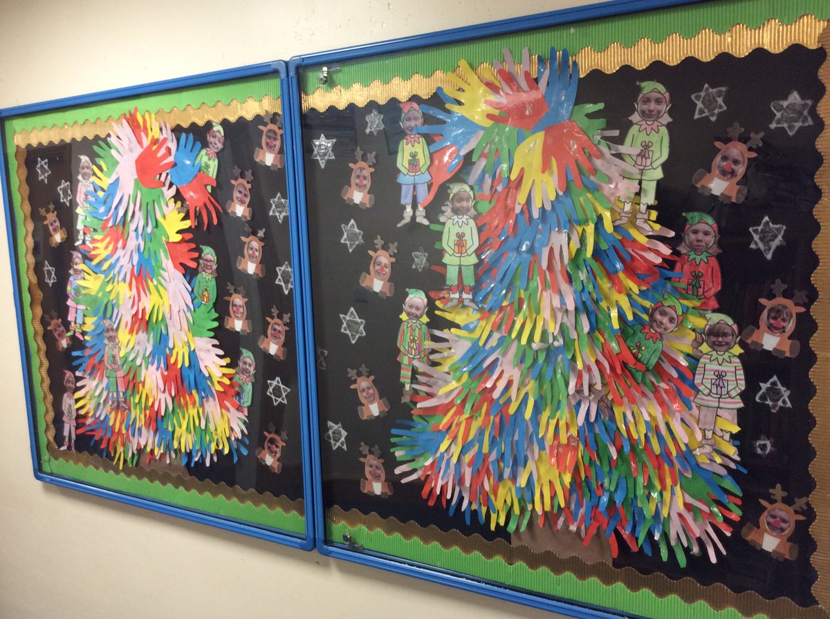 woodstonecps's tweet photo. Here are the Christmas boards outside our Year 4 and Year 6 classrooms - can you spot the stars on top of Year 6's Christmas trees?! https://t.co/f8dDQhBqaX