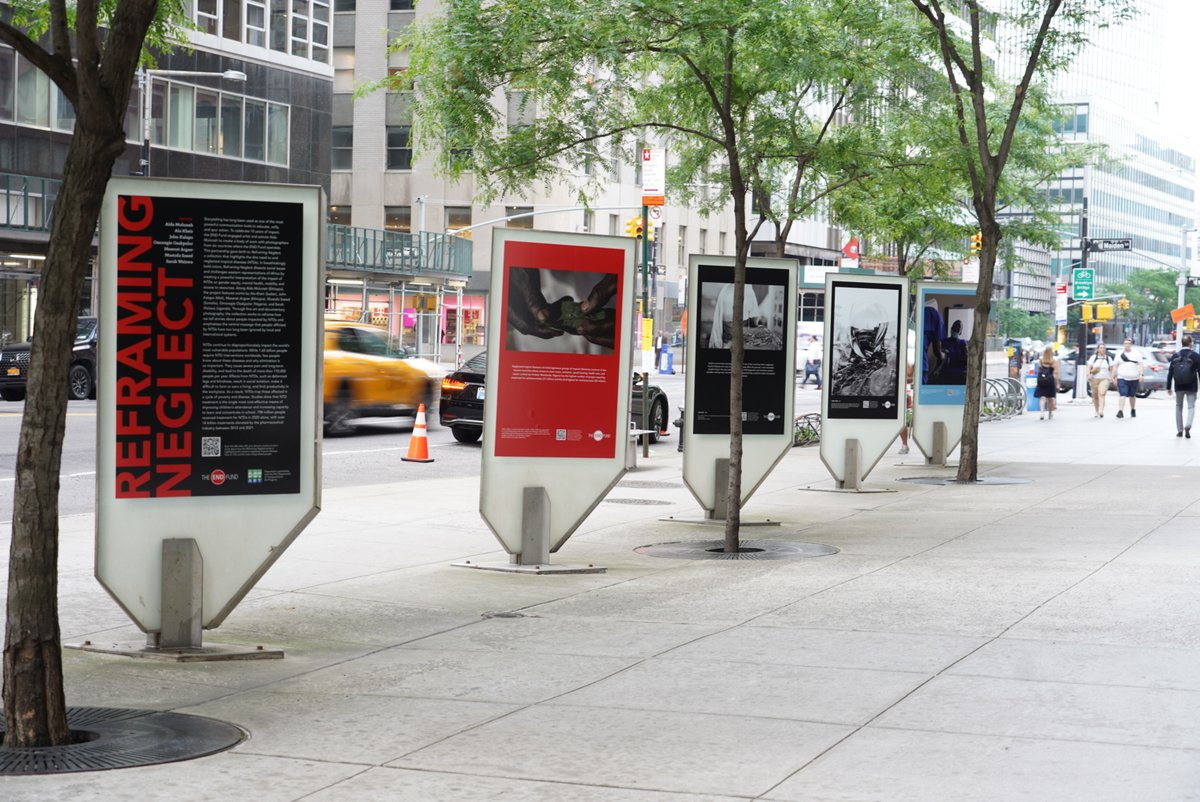 TheENDFund's tweet photo. Tomorrow is the final day of the #ReframingNeglect exhibition in partnership with @NYC_DOTArt. The series uses documentary and fine art photography to highlight the need to end #NTDs. Check it out at Water Street between Maiden Lane and Pine Street. #BeatNTDs https://t.co/LI24j4s72r