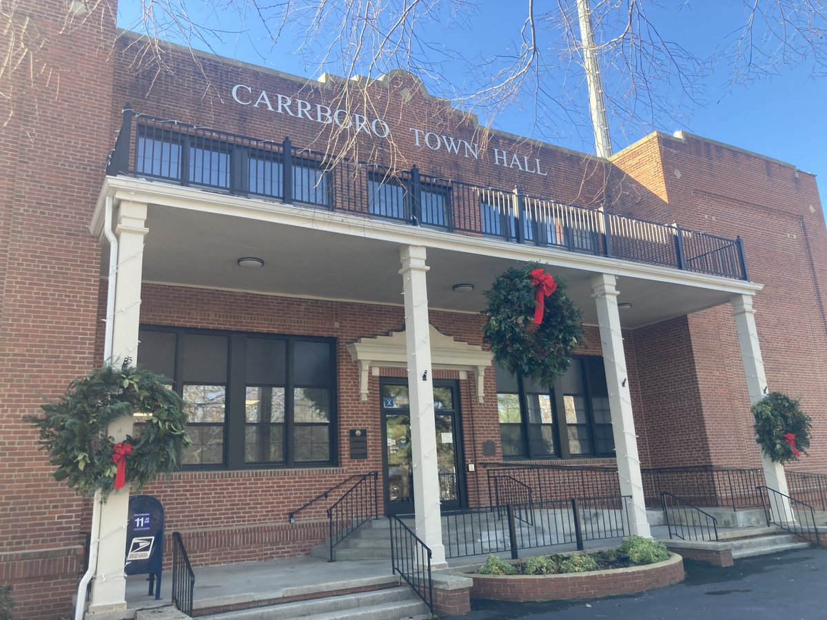 Susan4Carrboro's tweet photo. The exquisite wreaths are just in time for a packed Chamber at @CarrboroGov's Dec 5 organizational meeting, highlighted by the oath of office for Mayor @BFoushee; and Council Members @CFrayforCouncil, @EliazarPosada and #JasonMerrill. Thank you, Carrboro Community Garden Club! https://t.co/eA5jJXJOoU